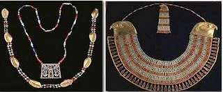 ancient egyptian jewelery holding amulets